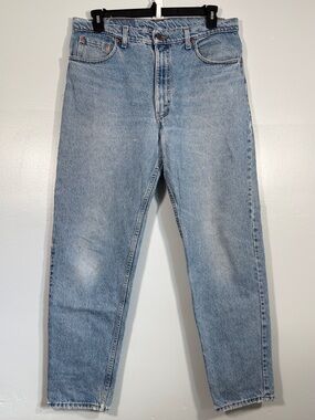 Vintage Levi’s 550 Light Wash Rigid Made in USA 90s 38 x 32